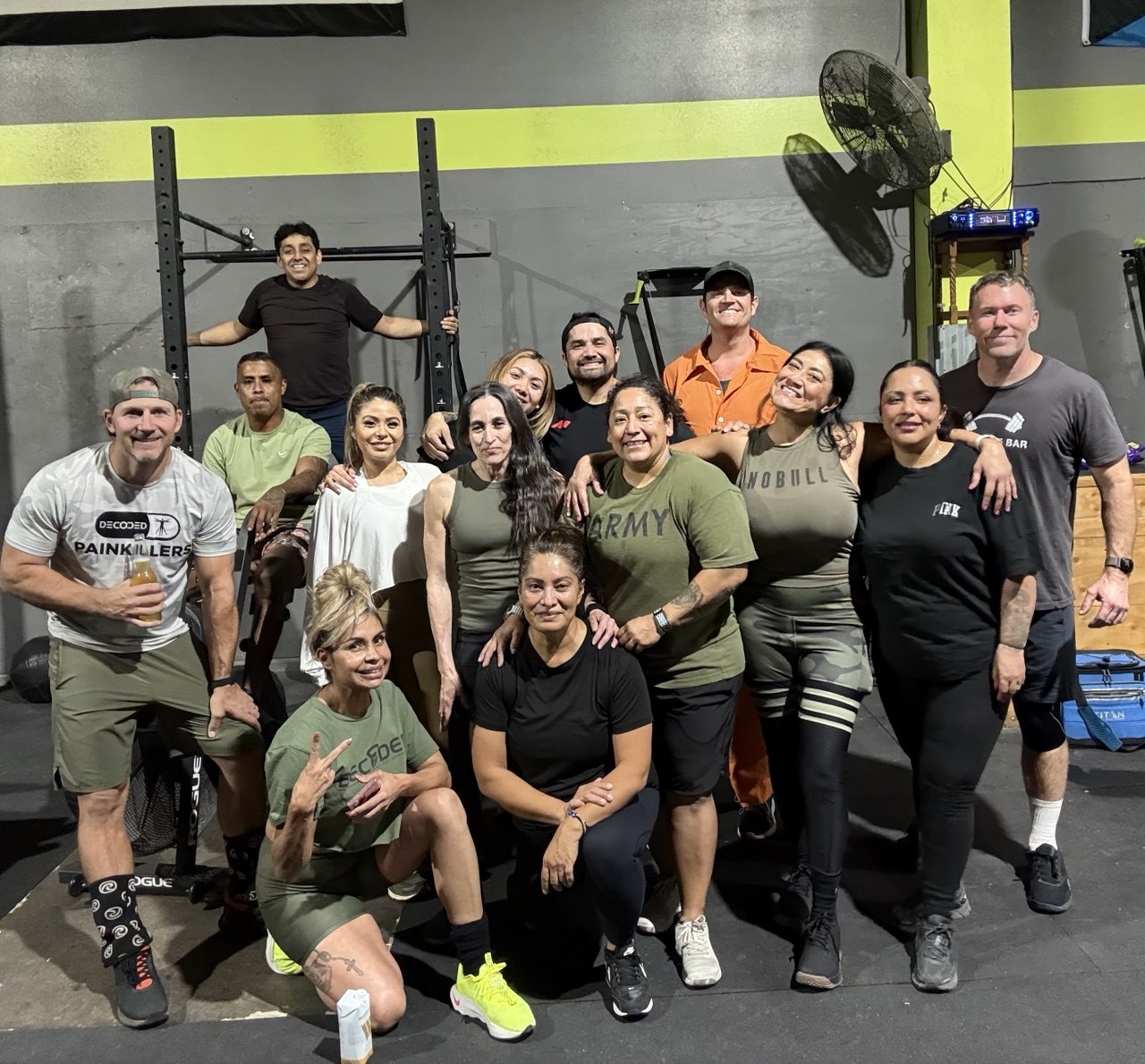 First Friday big group team photo in front of the rig